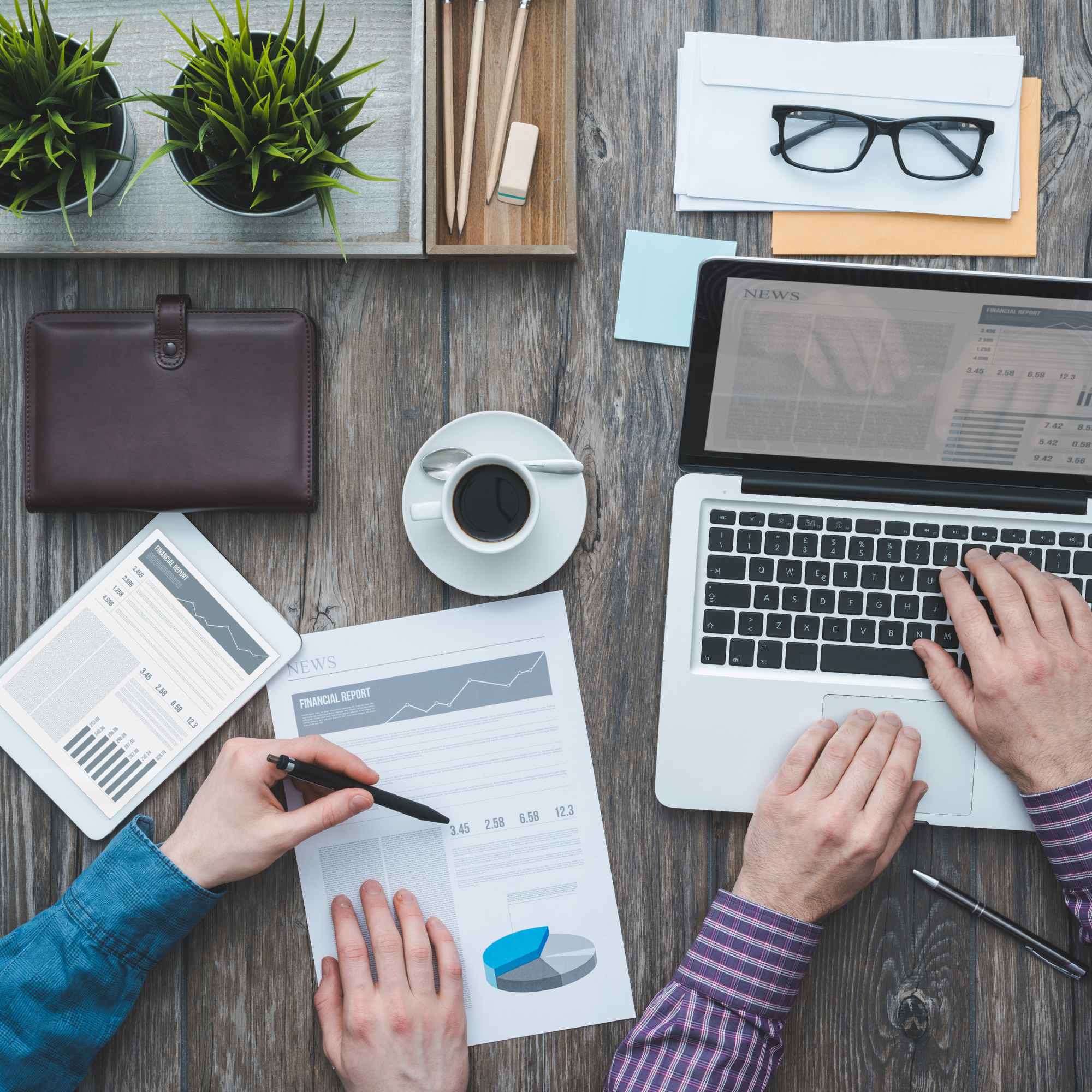 Two consultants reviewing financial data